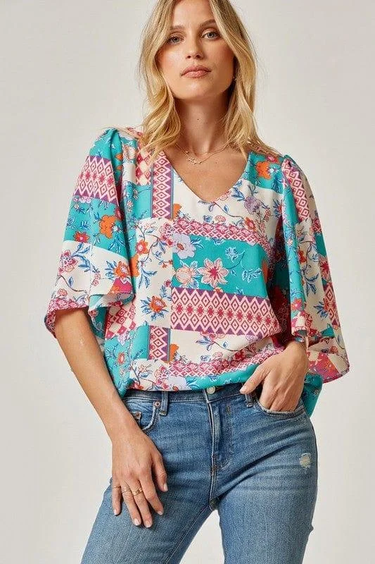 Island Getaway- print flutter sleeve top